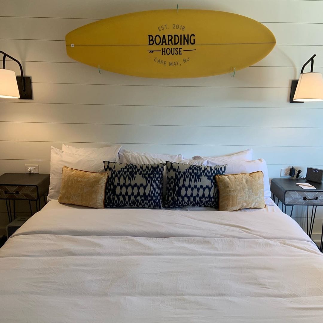 It really ties the room together. ?‍♀️ . Thanks again to our friends at Kona Surf Co. (@konasurfcompany) for creating the most perfect custom surfboards for our rooms. They couldn’t be more awesome. ?? . The Boarding House is open for business! Make your reservation on our website today! . (PS: Planning to travel with your four-legged little dude ? Give us a call at 609-884-4884 so we can set you up in one of our dog-friendly rooms!) . . . . . .