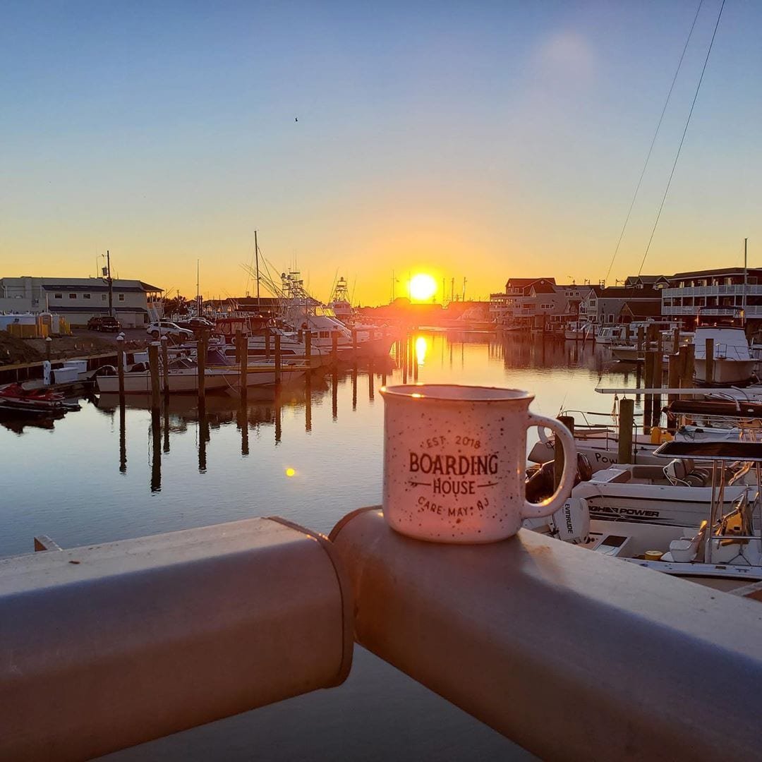 A perfect start to the day. ️
.
Brilliant Cape May sunrise and locally roasted coffee ️ in a Boarding House mug.
.
Here’s to a Sunday of rest and relaxation!
.
Rooms for the rest of the summer are filling up fast. Book on our website today!
.
(Note: Dog-friendly rooms must be booked via phone. Please give us a call at 609-884-4884 if you would like to travel with your pup!)
.
.
.
.
.
.
.
.